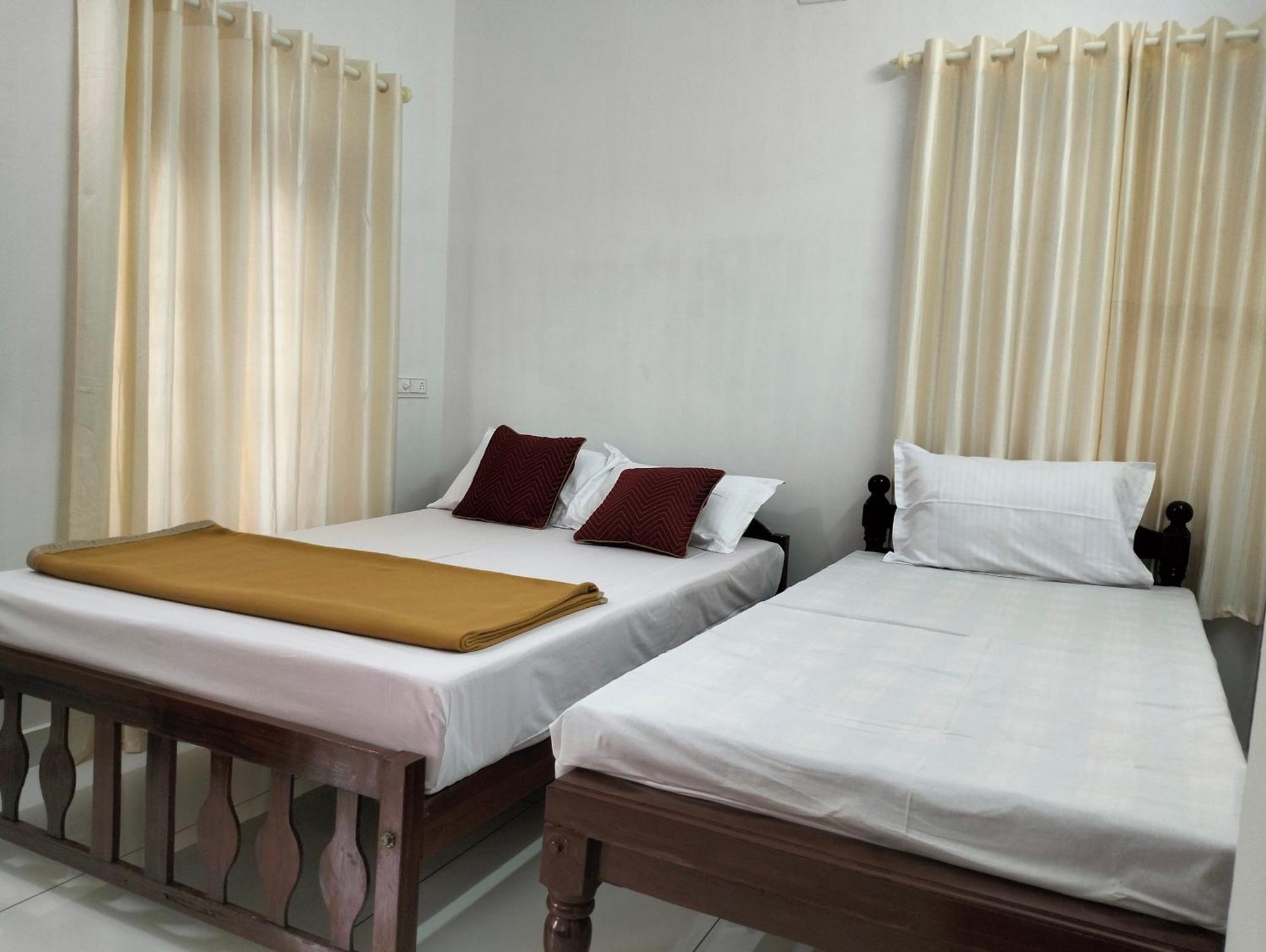 Guestland Homestay Kochi Zewnętrze zdjęcie