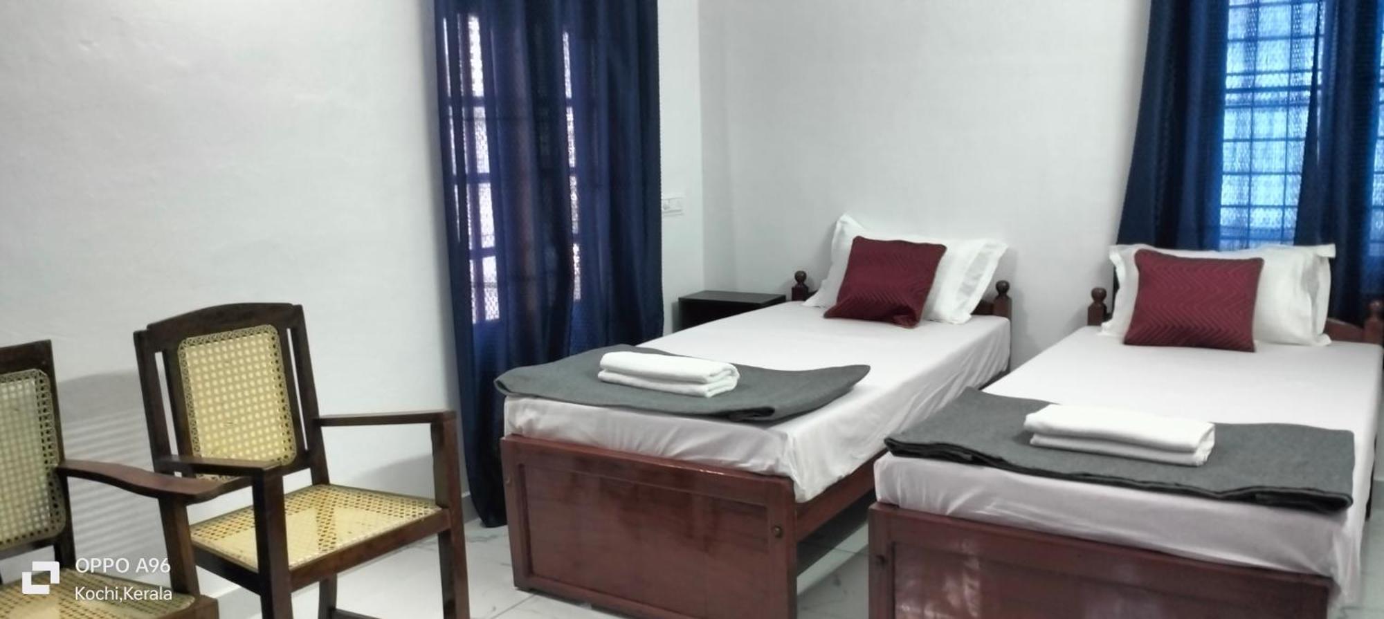 Guestland Homestay Kochi Zewnętrze zdjęcie